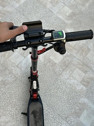 Elektrik nəqliyyatı: Elektrik skuter – qatlana bilən, şəhər içi rahat hərəkət üçün. Bu — 9
