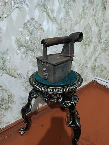 Qədim ütü retqi model