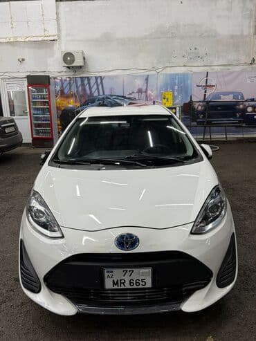 Toyota Aqua: 1.5 l | 2019 il Hetçbek