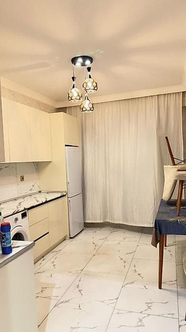 tarqovuda ev: Xırdalanın mərkəzində at hekəlinin yanı 12 mərtəbəli binanın 5ci — 2