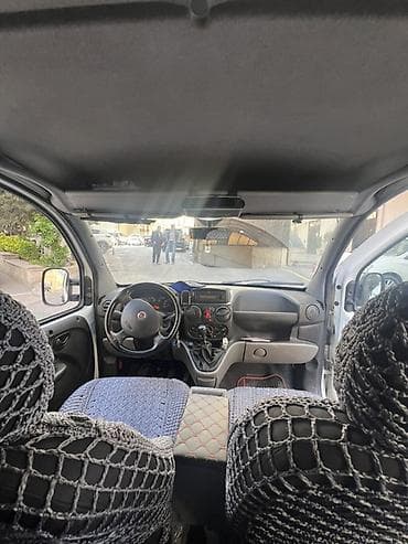 fiad doblo: Fiat Doblo (ağ rəng) – praktik və funksional miniven Xüsusiyyətlər: - — 9