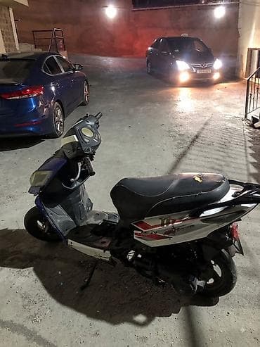 kasklar motor: Skuter – şəhər içi qısa məsafələr üçün praktik iki təkərli nəqliyyat — 3