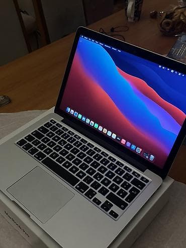 Apple MacBook Pro 13" - Gövdə: gümüş rəngli alüminium unibody, geniş