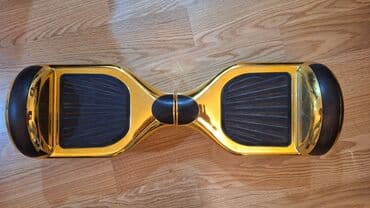 hoverboard qiymətləri: Qızılı rəngli 2 təkərli hoverboard (self-balance scooter) və dəmirdən — 2