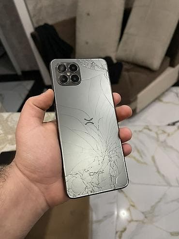 Kompüter, noutbuk və planşetlər: OMIX smartfon satılır 2 gün zarytqa saxlıyır Türkiyə telefonudur — 1