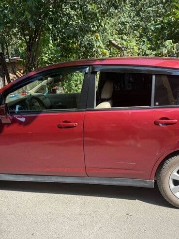 дом на колесах turbo az: Tünd qırmızı rəngli Nissan Tiida avtomobili, gündəlik istifadə üçün — 5