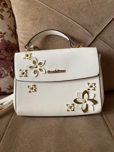 Toy paltarları və aksesuarları: Canta . Moskvadan alinib . Hec işlənməyib 15 — 3