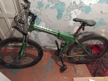asma mühərrikli velosiped nədir: Dağ velosipedi – qatlanan gövdəli model Xüsusiyyətlər: - Rəng: yaşıl — 2