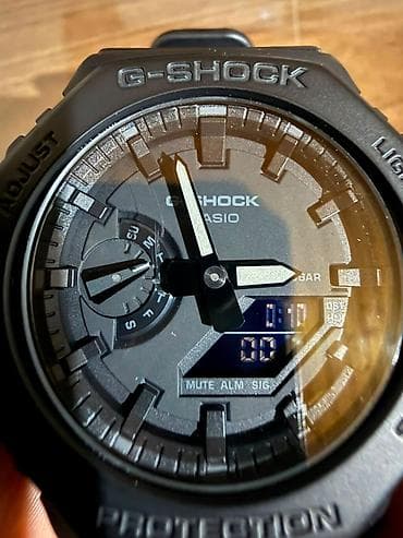 Casio G‑Shock GA‑2100 seriyalı qol saatı (analoq + rəqəmsal) — 1