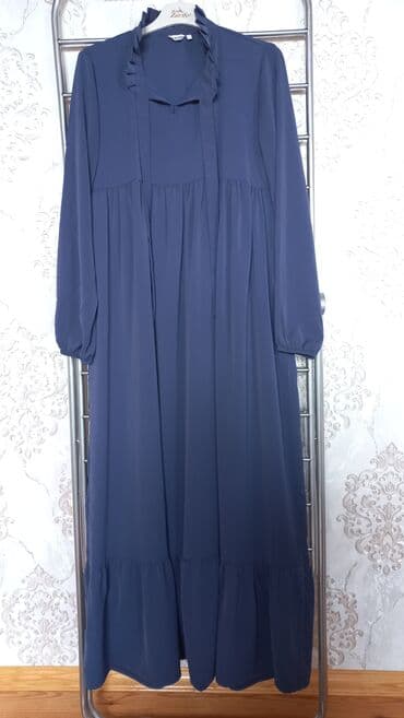 Baş geyimləri: Mavi rəngli iki uzun don dəsti 1) Tünd göy don - Yüngül, nəfəsalan — 2