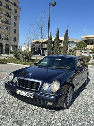 Mercedes-Benz E-Class (W210) sedan - Kuzov: 4 qapılı sedan, tünd göy — 2