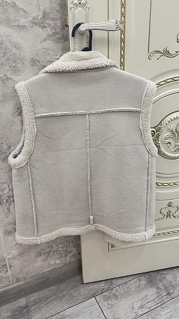 Digər qadın geyimləri: Qalın içlikli, qolsuz süni dəri jilet - Model: ikitərəfli üslubda — 4