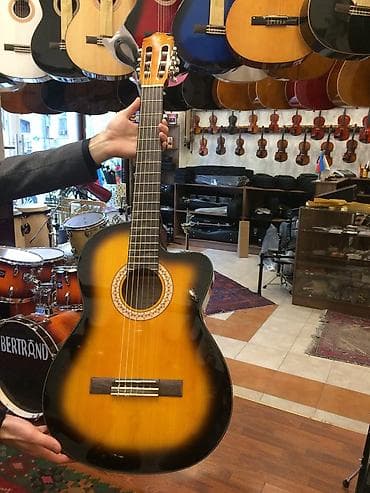 gitara çexolu: Rivertone klassik gitara
canta hediyye — 1