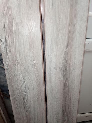 Açıq-boz ağac laminat döşəmə panelləri. 12.kv qalıb cox ucuz at lalafo.az Açıq-boz ağac laminat döşəmə panelləri. 12.kv qalıb cox ucuz