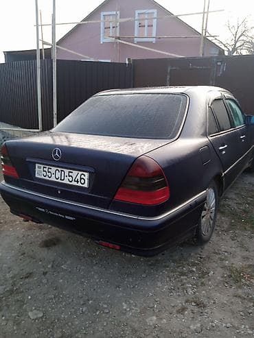 07 satılır: Mercedes-Benz E-sinfi (W210), sedan, tünd mavi rəng. - Kuzov: 4 qapı — 3