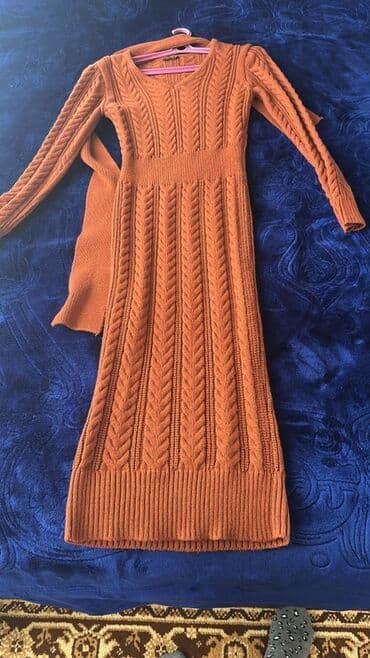 - Məhsul: Trikotaj qadın paltarı - Rəng: Tünd narıncı / qəhvəyi ton -