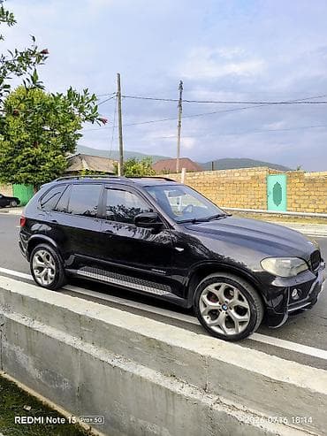 panel satış: BMW X5 (E70) – Qara rəngli, 5 qapılı premium SUV Mühərrik və ötürmə — 6