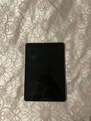 ipad 7 qiymeti: Apple iPad planşet - Korpus: gümüş rəngli alüminium gövdə, arxada — 1