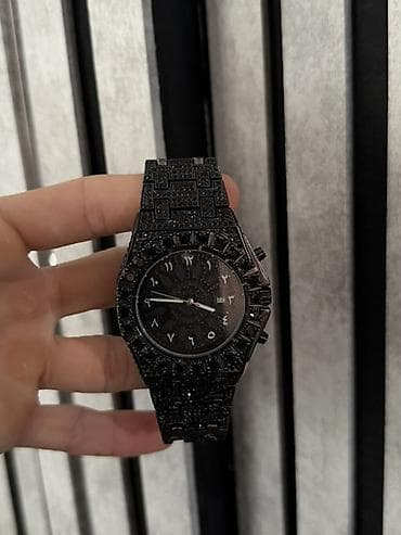 150 ye alinib 65 e satilir Qara tonlarda kişi qol saatı - Korpus və