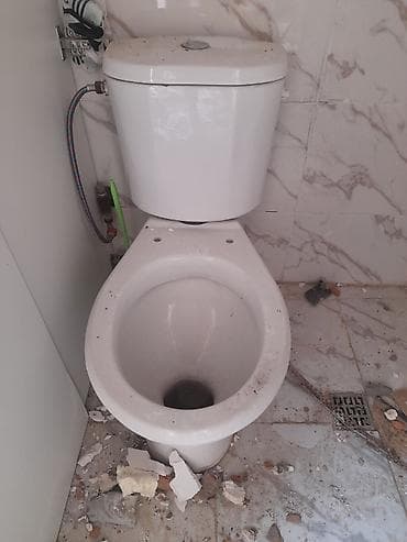 boru: Şaquli çıxışlı, döşəməüstü kombinəedilmiş unitaz-kompakt — 1