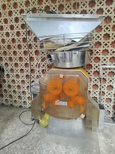 Zumex sənaye tipli portağal sıxan aparat. 20 klo çəkisi var. qiyməti