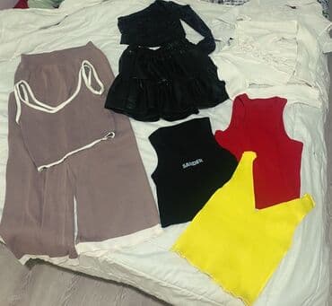 Qadın geyimləri dəsti Tərkib: - Trikotaj iki hissəli dəst