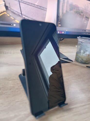 ТВ и видео: Xiaomi 11 Lite, 128 ГБ, цвет - Черный, 
 Кнопочный, Отпечаток пальца, Две SIM карты — 1