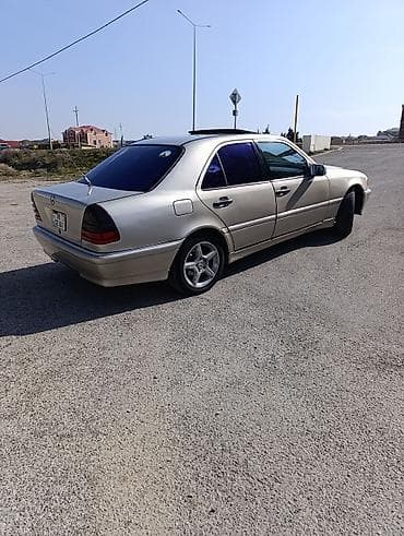 bmw e36 kuza: Mercedes-Benz C-Class: 2.3 l | 1998 il Sedan — 3