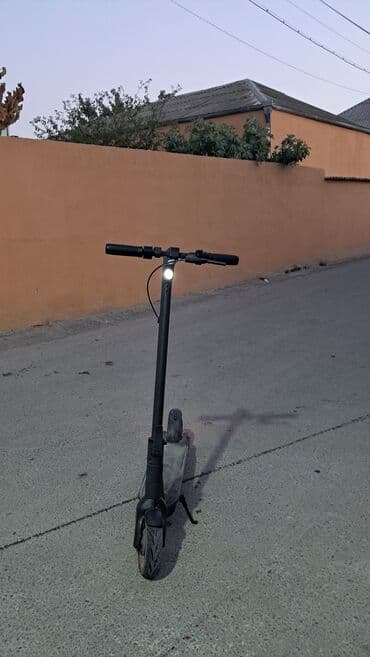 elektron gitara: İşlənmiş Elektrik samokat 12", 501 - 750 Vt, 26 - 35 km/s, Ünvandan götürmə — 2