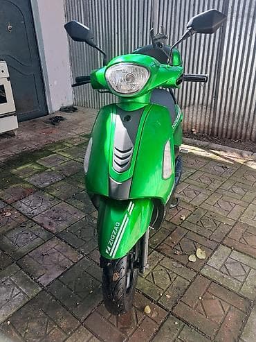 Yaşıl rəngli ZIGZAG skuter - Şəhər içi sürüş üçün kompaktdır, dar lalafo.az -da Yaşıl rəngli ZIGZAG skuter - Şəhər içi sürüş üçün kompaktdır, dar