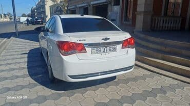 qapi zili: Chevrolet Cruze LT sedan - Kuzov: ağ rəng, 4 qapı, arxa spoylerli - — 7