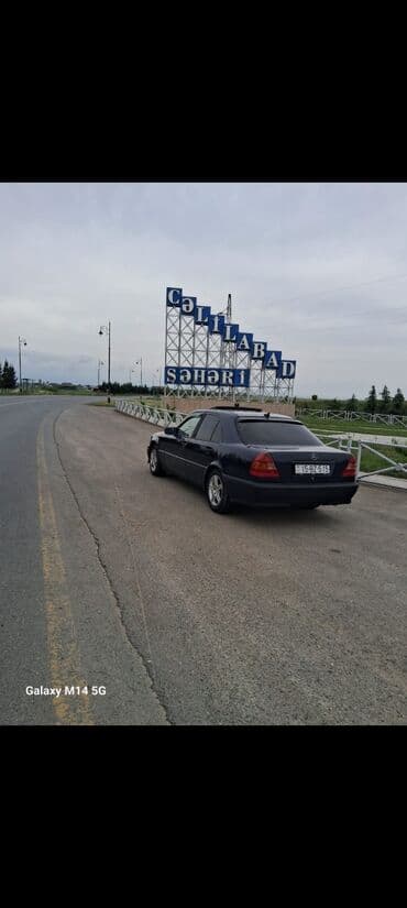 w202 suretler qutusu: Mercedes-Benz C‑Class (W202) sedan - Kuzov: 4 qapılı sedan, tünd mavi — 1