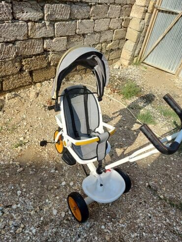 velosiped uşaq üçün: Uşaqlar üçün təkərli velosiped, boz və sarı rənglərdə olan günlüklə — 1