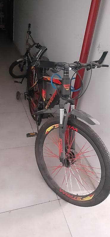 goran velosiped: STRIM brendli dağ velosipedi - Rəng: qara üzərində qırmızı-sarı — 2