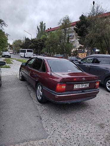 vaz 2107 paxlava salon: Opel Vectra sedan - Korpus: 4 qapılı sedan, tünd bordo rəng - Nömrə — 5