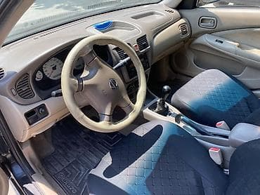 diskler 16: Nissan Sunny: 1.3 l | 2009 il Sedan — 4