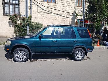baqaj: Honda CR‑V (1-ci nəsil) – yaşıl rəngli, 5 qapılı, şəhər və yüngül — 5