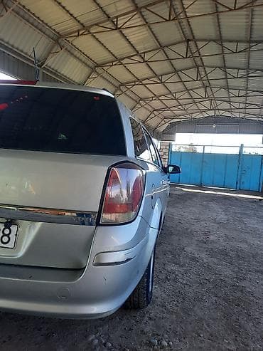 kia rio kreditle satisi: Opel Astra 1.3 turbo dizel (universal) – gümüşü rəngdə, 5 qapılı — 5