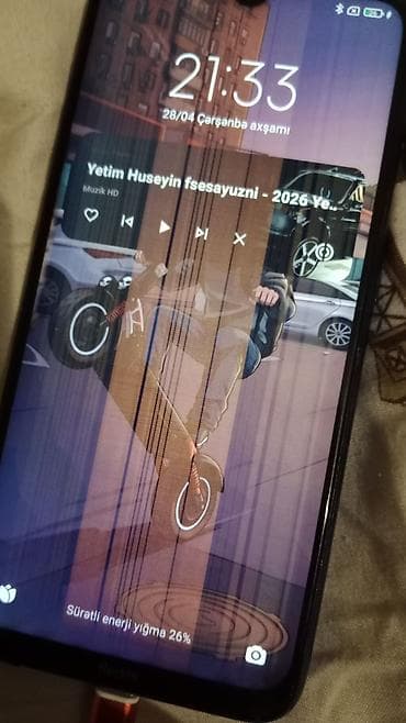 newtech kamera: Xiaomi Redmi (mavi rəng) - Ekran: damla-notçlu tam ekran. Şüşədə — 1