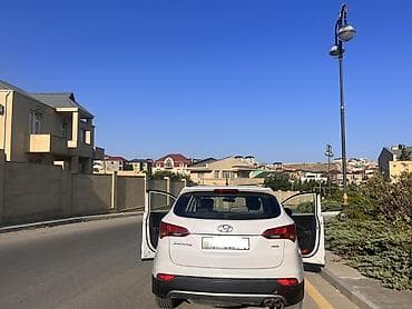 keys sat: Hyundai Santa Fe, ağ rəng, 4WD krossover/SUV. Xüsusiyyətlər: - Tam — 6