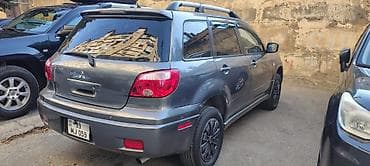 mitsubishi lancer evolution: Mitsubishi Outlander: 2 l | 2006 il 220000 km Ofrouder/SUV — 1