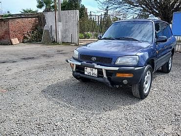 ford transit satisi: Toyota RAV4 (I nəsil) kompakt krossover - Kuzov: 5 qapılı, tünd mavi — 3