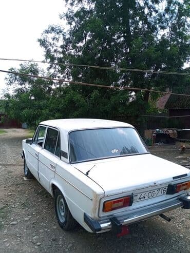 ваза стеклянная прозрачная высокая без узора: VAZ (LADA) 2106: 0.6 l | 1997 il 75000 km Sedan — 2