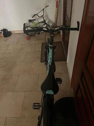 24 dyumlu velosiped: 26 ölçülü Velosiped satılır. 250azn-ə alınıb. Sürmeye ehtiyac — 9