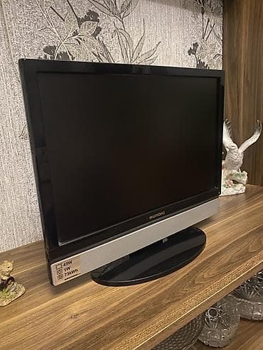 Televizorlar: Grundig LCD televizor - Ekran: təxminən 26–32 düym (şəkillərə əsasən — 2