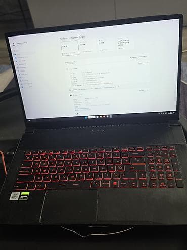 oyun notebooku: MSI oyun noutbuku - Model: MSI (qapaqda qırmızı əjdaha loqosu, oyun — 1