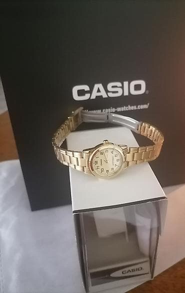 casio qadın saatı: Casio qadın qol saatı – klassik qızılı dizayn - Brend: Casio - Korpus — 1