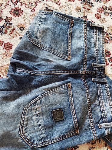 Верхняя одежда: Cins şalvar.28razmer.şəkilde var razmeri.almanyadan alınıb.bir necə — 3