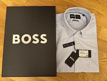 Digər kişi geyimləri: BOSS kişi köynəyi – açıq mavi rəng, klassik düyməli model. - — 2