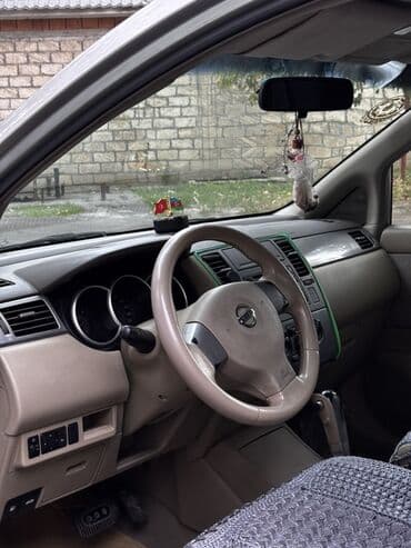 mersedes disk r15: Nissan Tiida: 1.6 l | 2006 il Sedan — 11